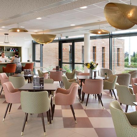 Le Criterium Aparthotel Ecouflant Bagian luar foto