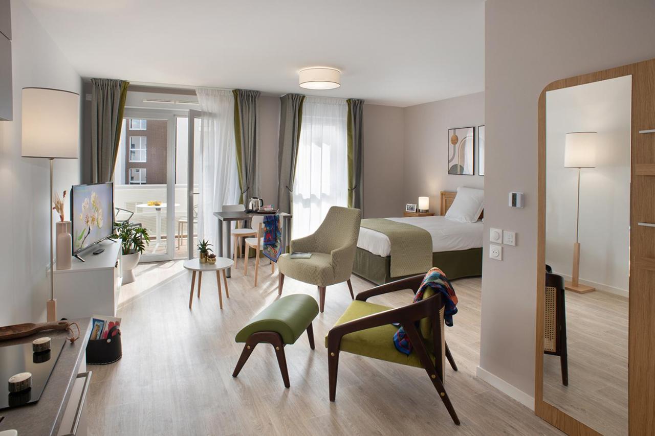 Le Criterium Aparthotel Ecouflant Bagian luar foto
